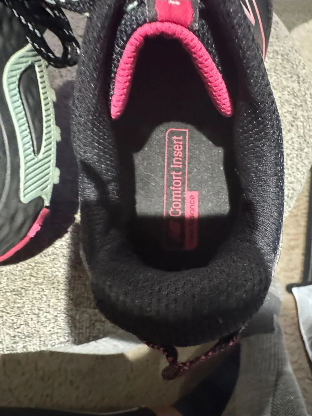 New Balance Women’s Black Athletic Sneakers with Pink and Teal Accents